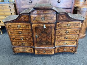 An 18thC Austrian parquetry/marquetry inlaid table top cabinet with multiple drawers and central