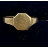 A yellow metal signet ring, tests as 14 carat gold. Weight 5.3gm. Size H/I.