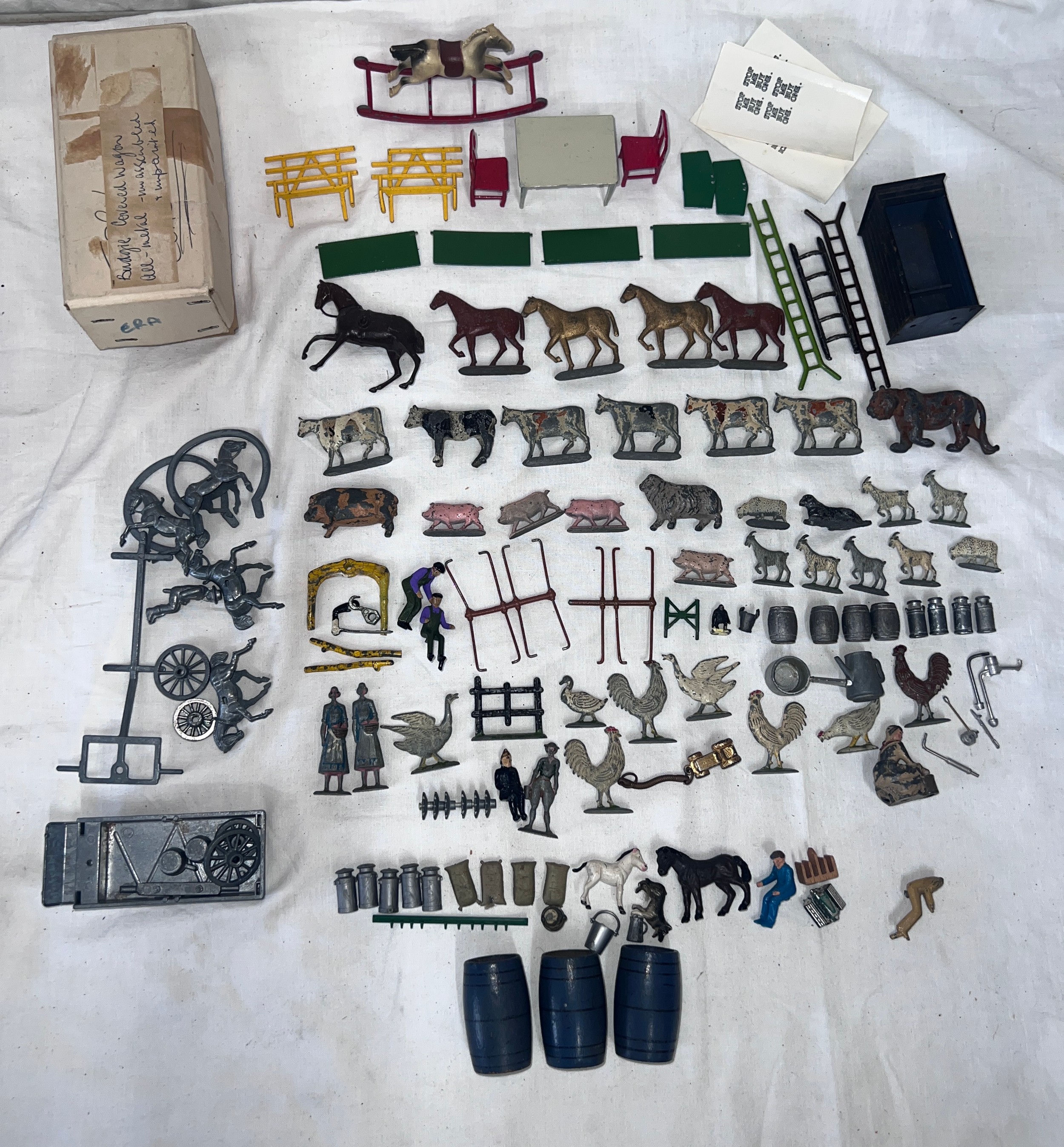 Farm toy accessories to include lead animals, some plastic and and incomplete Budgie Covered Wagon.