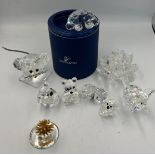 A quantity of various Swarovski figures including a boxed tortoise, mouse, elephant, teddies etc.