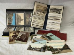 A Collection of postcards and books. Approx 100+ of Hull in an album, 50+ Beverley cards loose, 100+