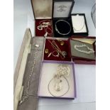 A quantity of silver and rolled gold jewellery to include bangles, pendants, watch chain etc.