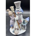 A boxed Lladro porcelain figure group 5713 The Snow Man, 20.5cm h.