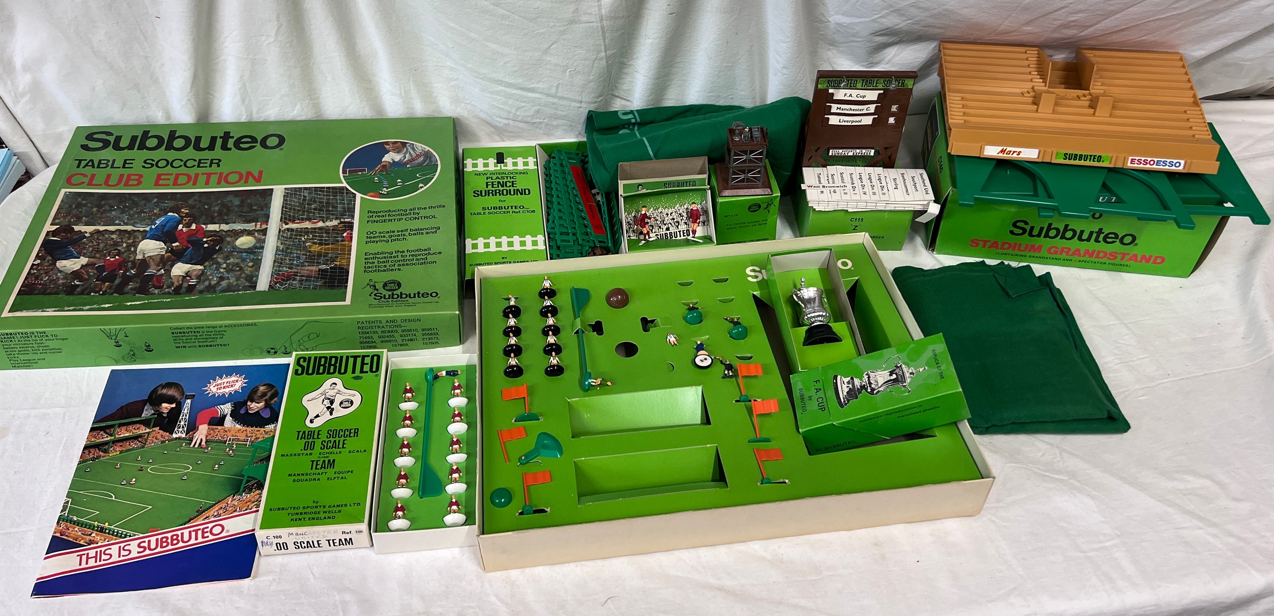 A collection of Subbuteo to include Club Edition, Scoreboard, teams, F.A. cup etc.