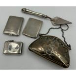 Five hallmarked silver items to include a silver purse Birmingham 1913 by Davis Moss & Co, a vesta