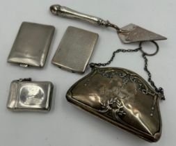 Five hallmarked silver items to include a silver purse Birmingham 1913 by Davis Moss & Co, a vesta