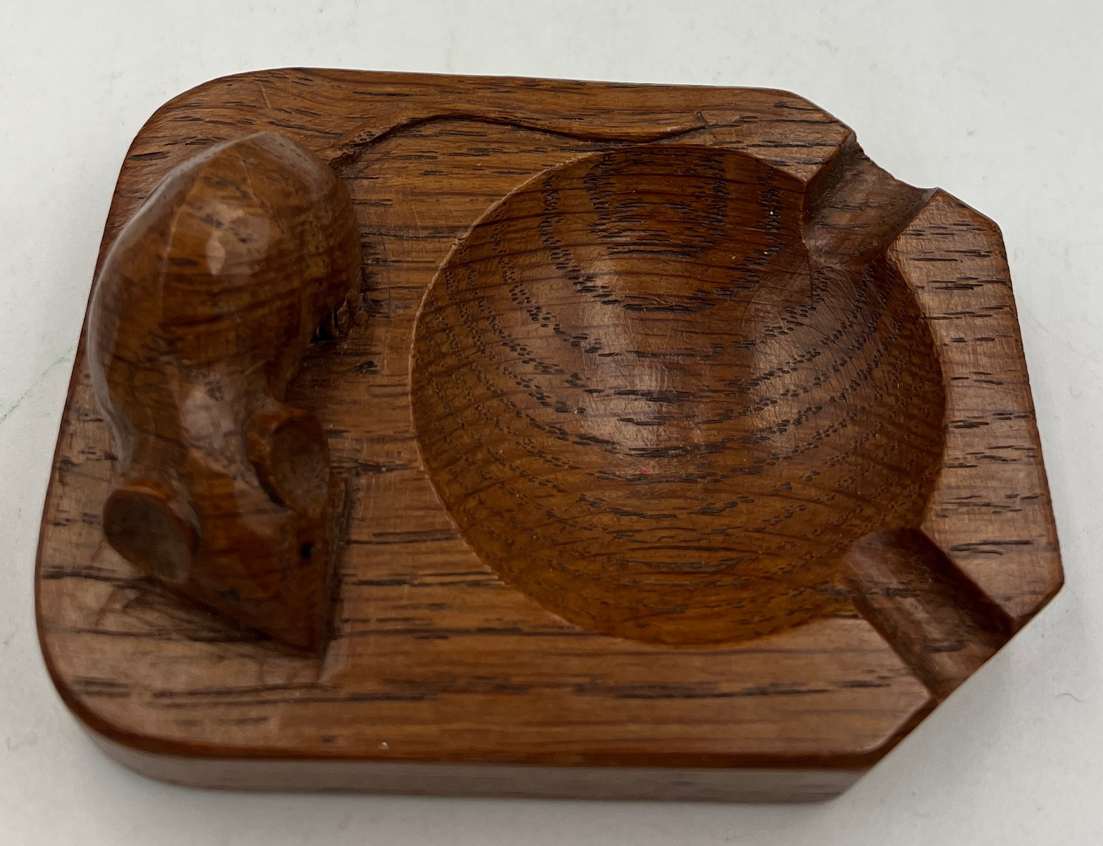A Robert Thompson of Kilburn, Mouseman ashtray with carved signature mouse. 10cm x 7.5cm. - Image 2 of 2