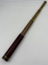 A G Adams London brass and mahogany telescope. 75cm l extended.