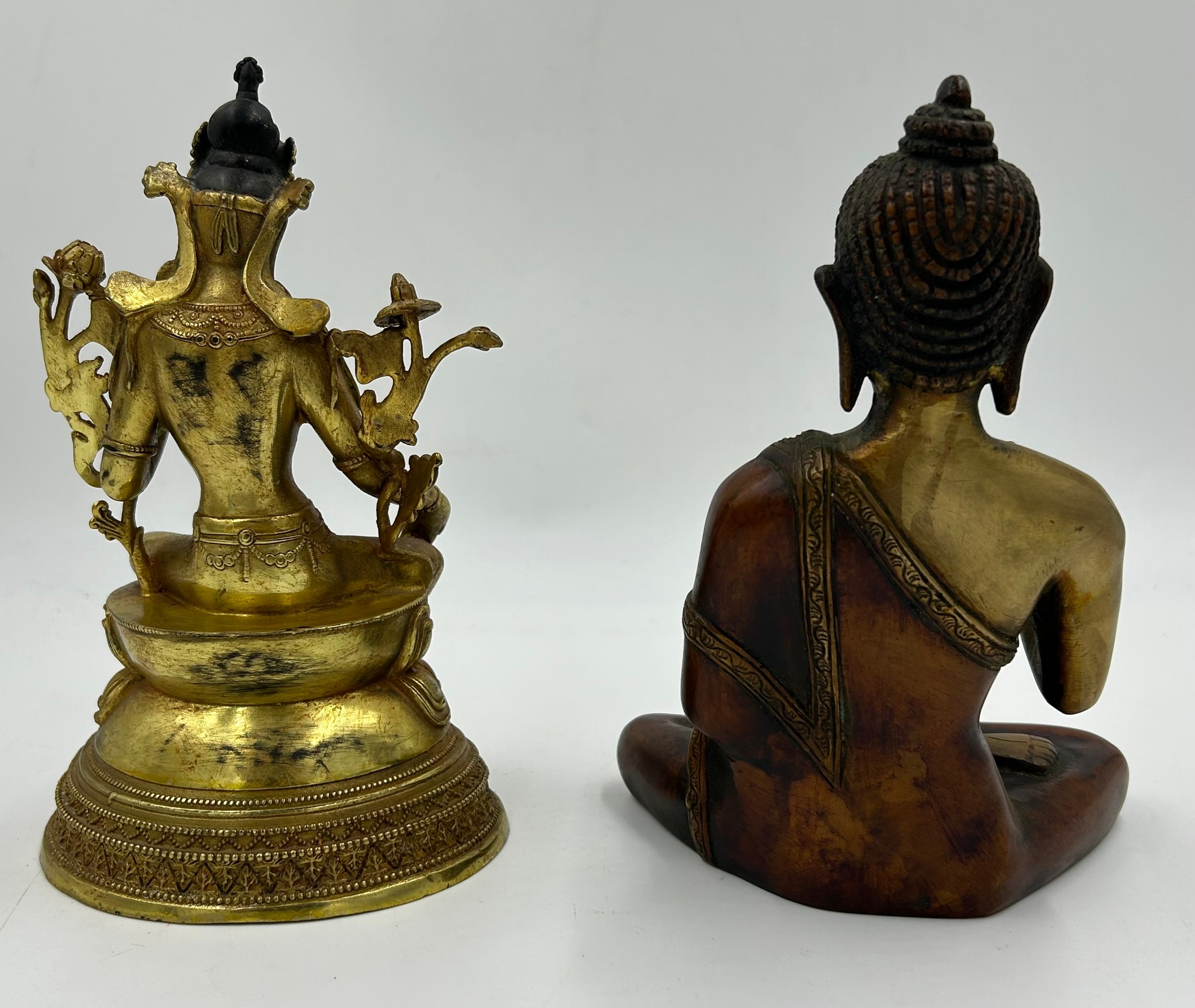 A Tibetan bronze seated figure of Green Tara 22cm h together with a heavy brass hand crafted meditat - Image 2 of 9