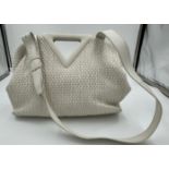 Bottega Venata Point leather bag with detachable strap in white with magnetic clasp fastening.