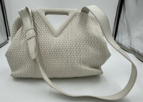 Bottega Venata Point leather bag with detachable strap in white with magnetic clasp fastening.