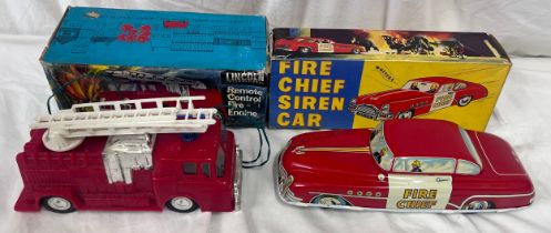 A tin plate Fire Chief Siren Car 9/147 by Welsotoys and a Lincoln International Remote Control