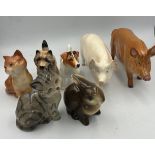 A collection of ceramic animals to include Beswick Jack Russell dog, Wallqueen pig, cat, Doulton