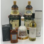 A collection of whisky to include : Six Isles Reserve 70cl in presentation tube, a boxed Nikka