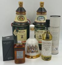 A collection of whisky to include : Six Isles Reserve 70cl in presentation tube, a boxed Nikka