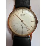 A Gruen Precision wristwatch with subsidiary seconds dial on black leather strap. Good working