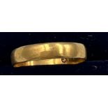 A 22 carat gold wedding band. Size O. Weight 2.2gm.