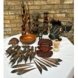 An unusual lot of tribal wooden items to include a wooden painted boar, wooden figures and mask wall