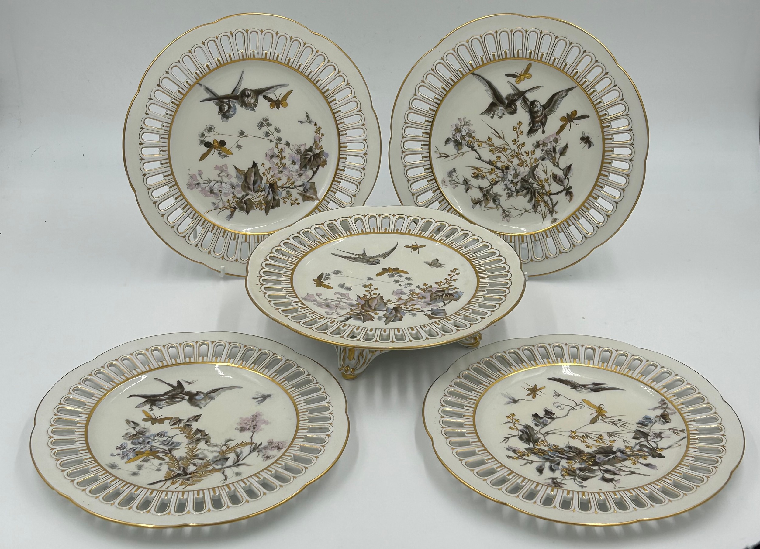 Fischer & Mieg 19thC porcelain part tea service, with ribbon borders, floral, bird and gold insect