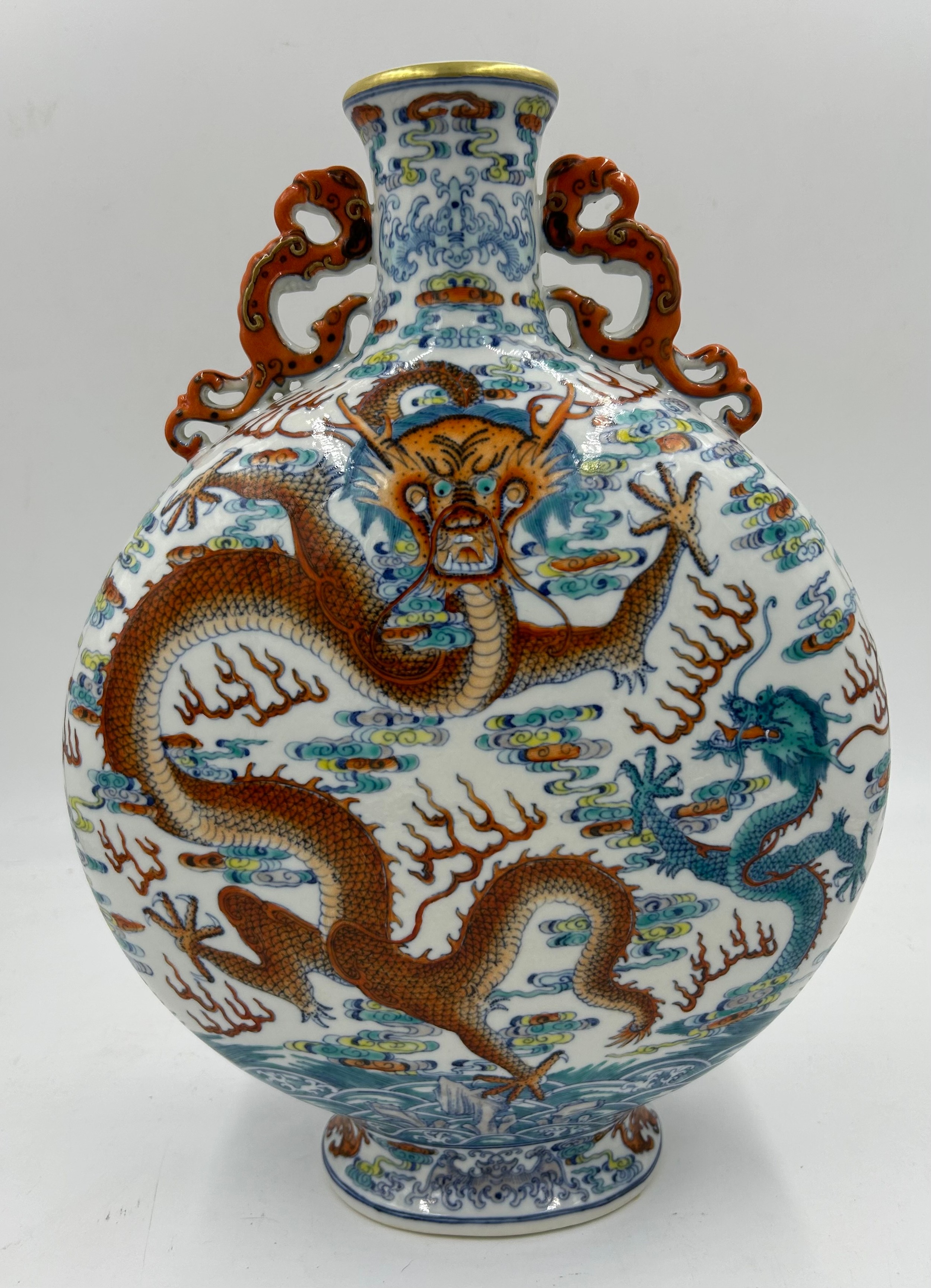 A 20thC Chinese Douai porcelain dragon double handle moon flask vase. 39cm h x 29cm w.