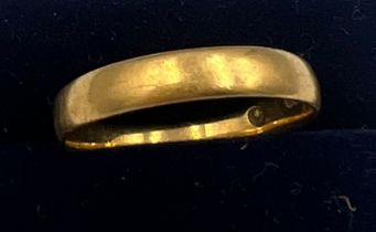 A 22 carat gold wedding band. Size R. Weight 3.1gm.