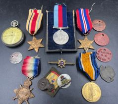 A WW I/II group of 5 medals to include The Africa Star, Victory Medal, Battle of Britain Star, WW