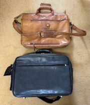 A Rowallan brown leather laptop case with multiple zipped pockets and padded laptop cover, along