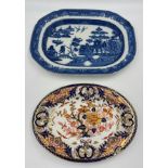 Two 19thC platters to include Derby 32cm x 23cm and willow pattern, 38cm x 29cm.