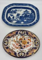 Two 19thC platters to include Derby 32cm x 23cm and willow pattern, 38cm x 29cm.