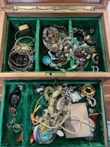 A carved wooden box and contents of vintage costume jewellery to include Victorian jet pendant