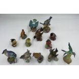 Thirteen various bird figurines to include Royal Worcester Marsh Tit, Wren, American Robin,