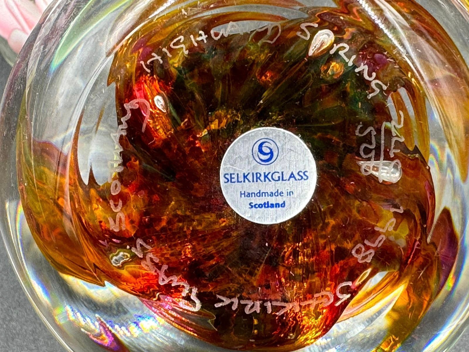 A collection of glass paperweights to include one Selkirk, 2x Caithness, together with a glass vase. - Image 2 of 3