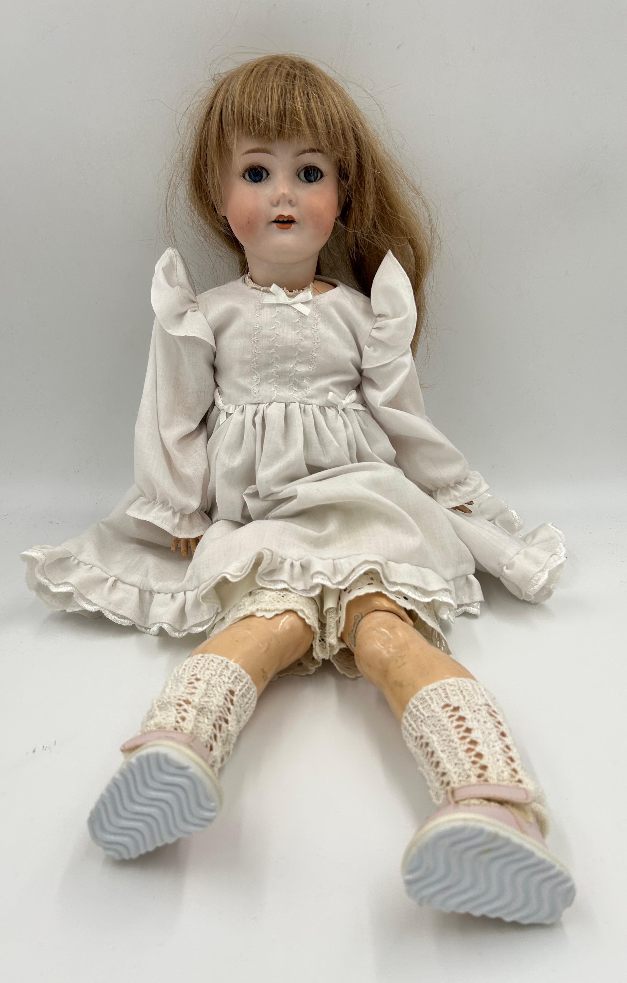 Large A.C.M Bergmann Bisque headed Doll, marked 1916, 6 1/2 to back of neck. Jointed limbs on