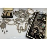 A large quantity of mainly silver vintage jewellery to include two ingots, weight 52gm, bangles,