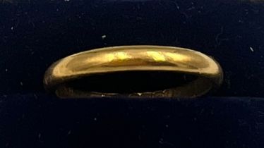 A 22 carat gold wedding band. Size Q. Weight 3.7gm.