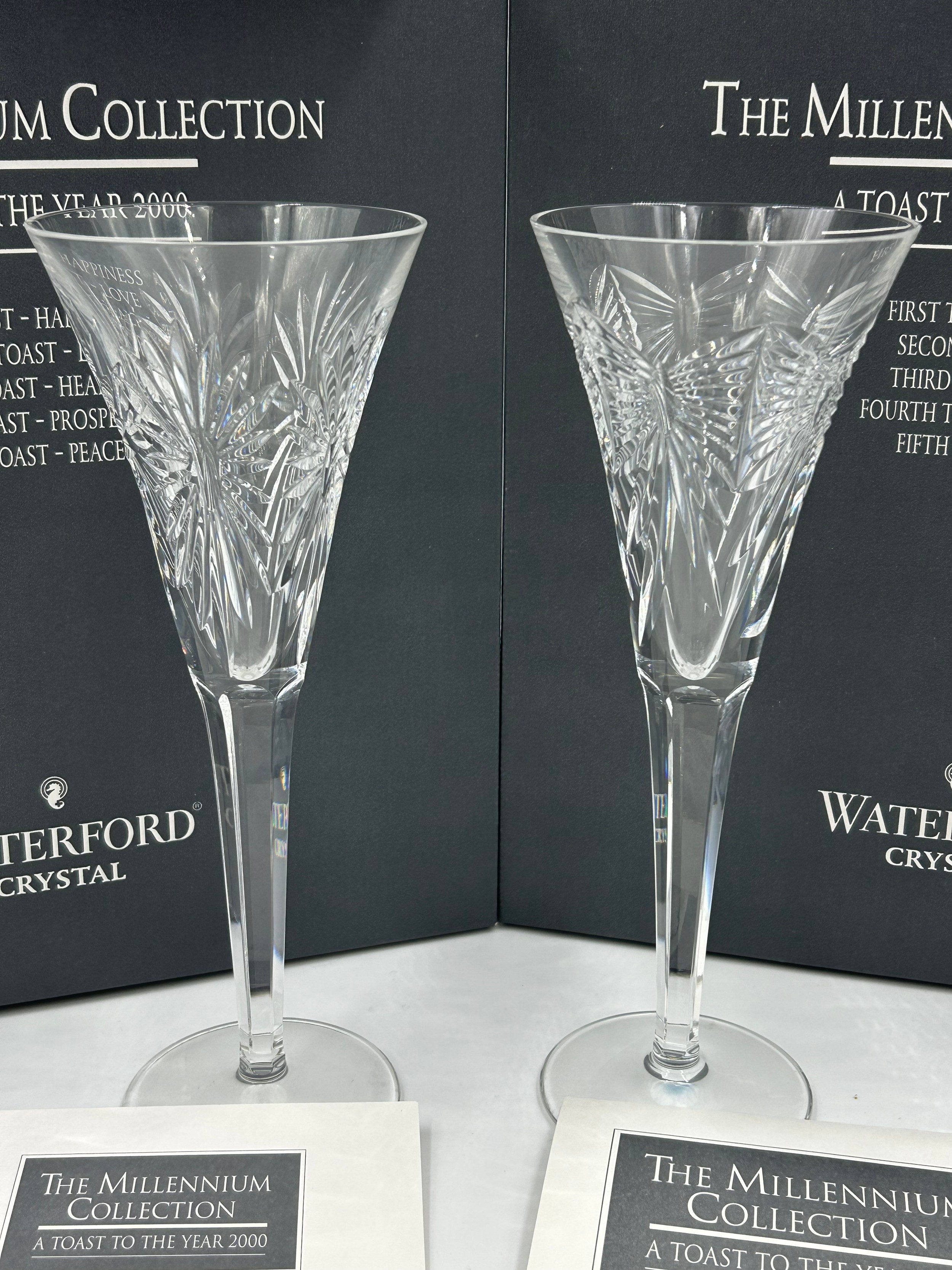 Two boxed pairs of Waterford crystal champagne flutes from 'The Millennium 2000 Collection', 23. - Image 2 of 3