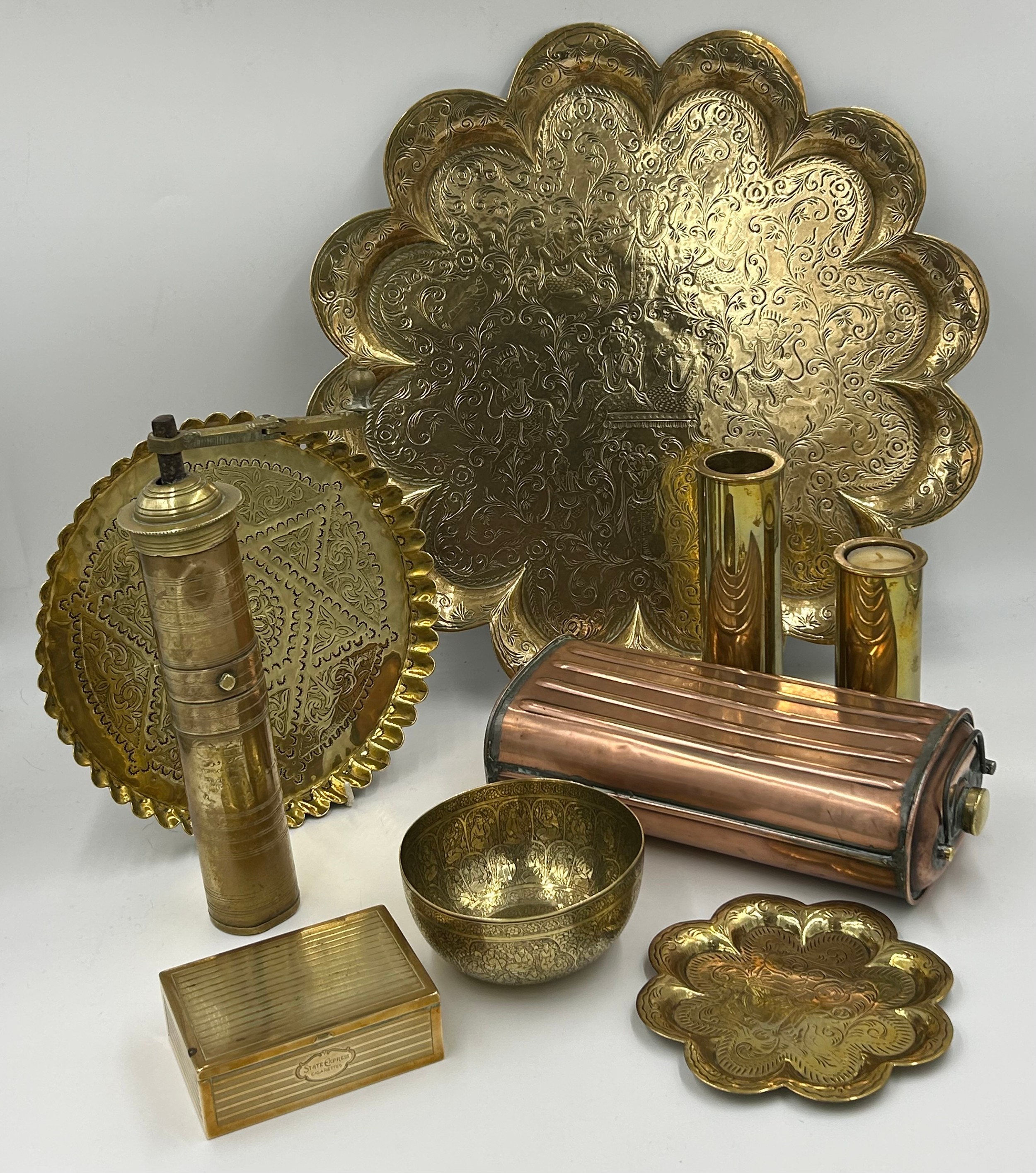 Brass ware to include a scalloped tray 45cm d, small tray, bowl, galleried tray all with Eastern