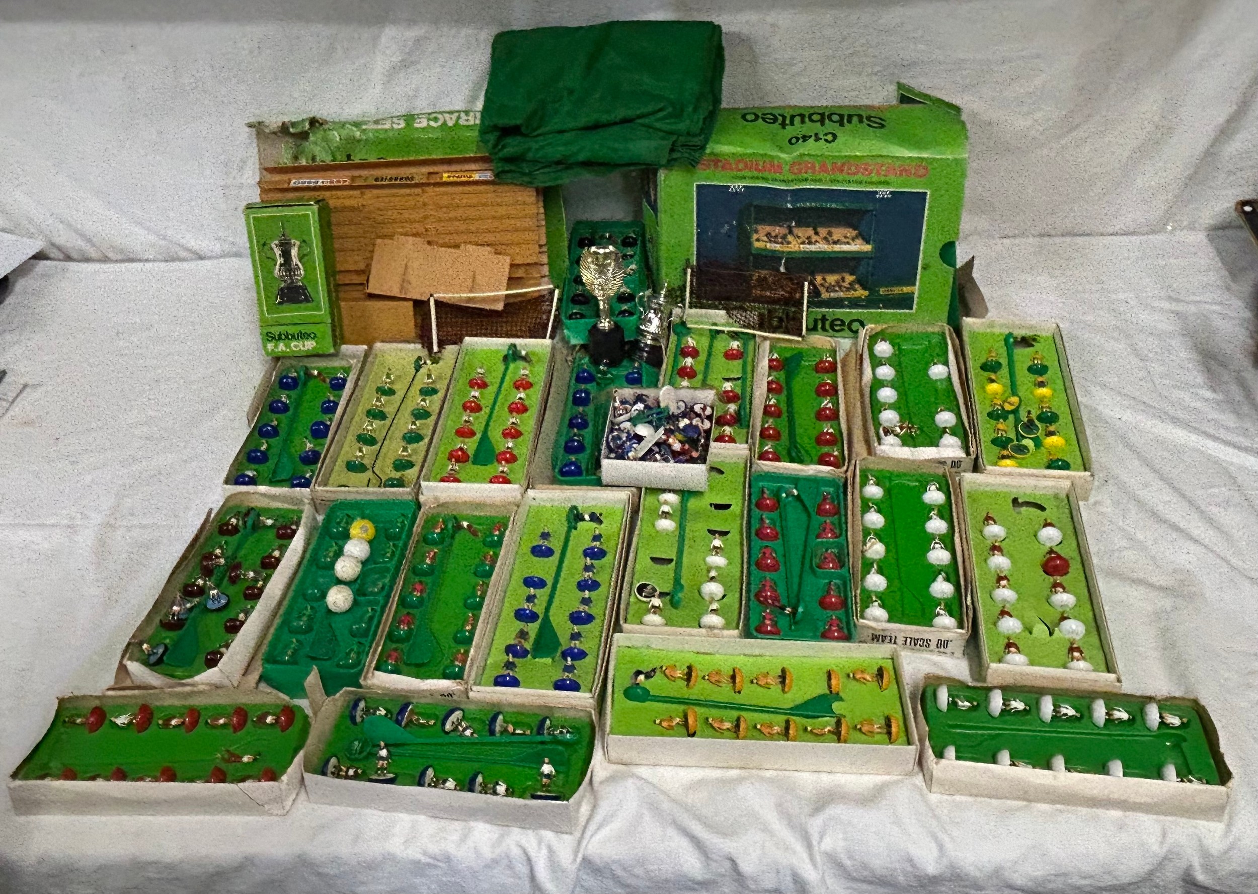 A collection of twenty-one vintage 00 scale Subbuteo teams comprising England, Crystal Palace,