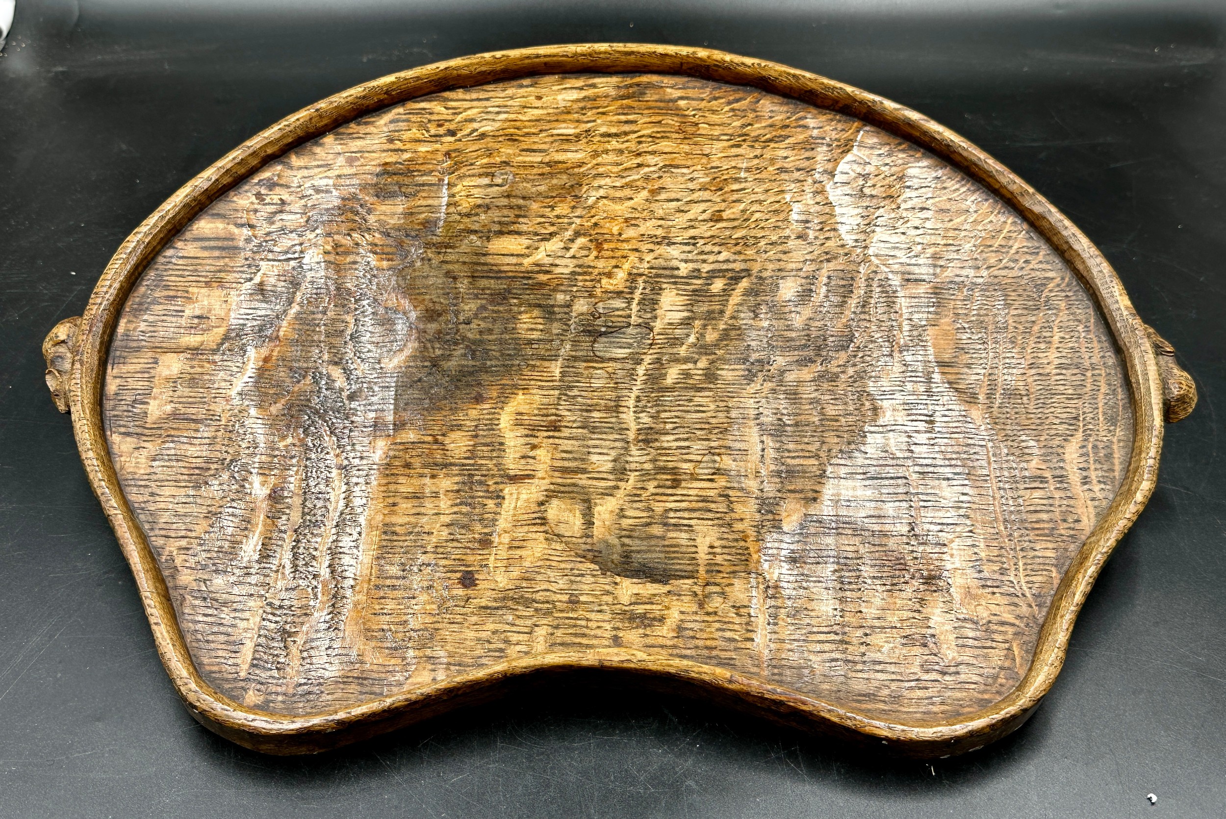 Robert Thompson 'Mouseman'- adzed oak kidney shaped tea tray with carved mouse signature handles. 47