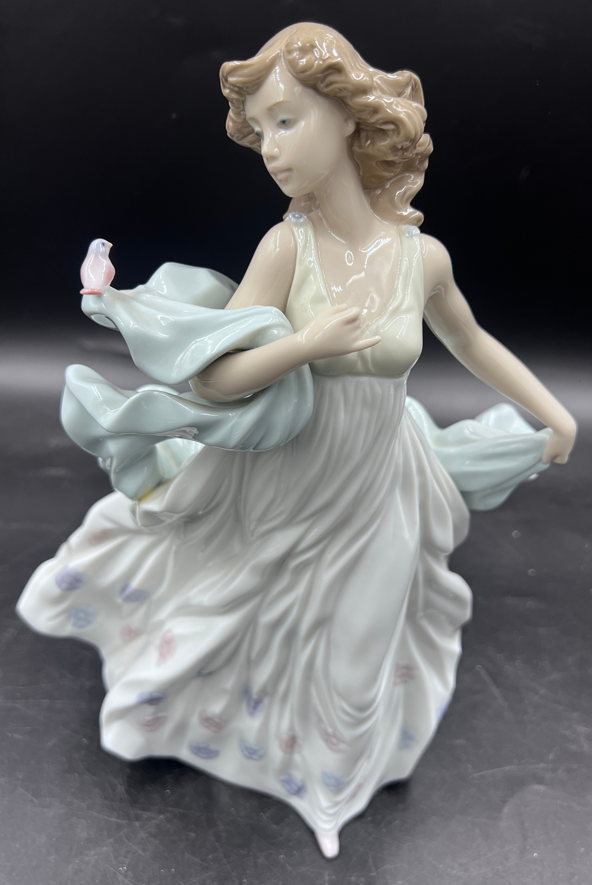 Lladro boxed 6193 ' Summer Serenade ' figure, depicting a young woman with dress and bird, 30 cm h.