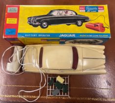 Telsalda De Luxe Jaguar Mark 10 Saloon, cream plastic body with friction motor, roof rack and five