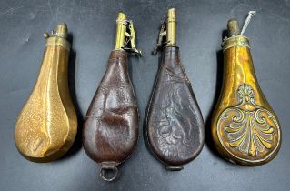 Four powder flasks, two leather and two brass and copper both marked G & J W Hawksley. Both brass