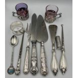 Various silver items to include Lipstick holder, napkin ring, Cup holders by William Comyns, boxed