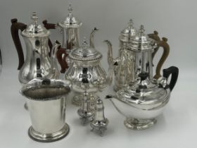 Selection of teapots and coffee pots, one set of matching Barker Ellis coffee and teapot with swan