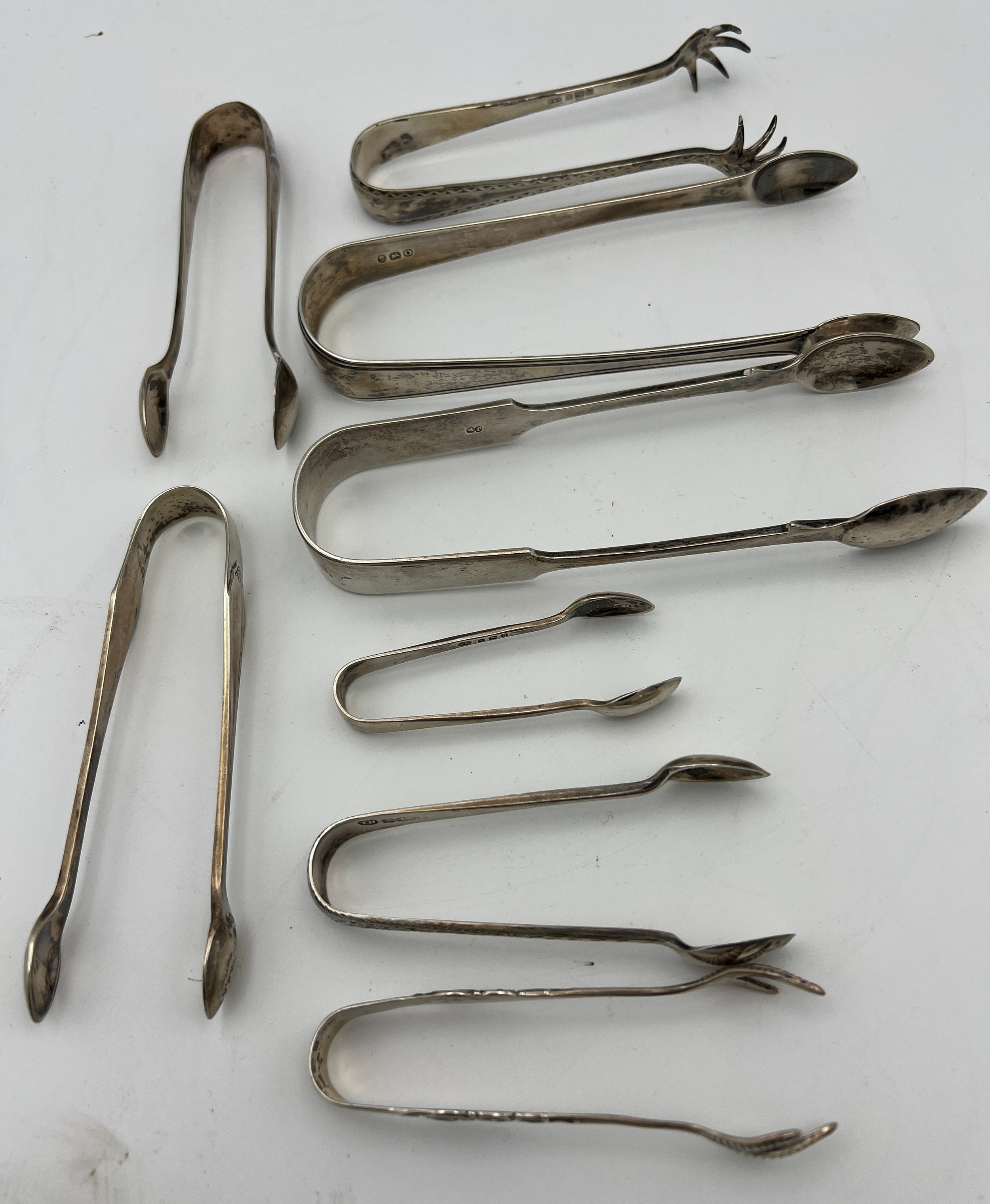 Eight hallmarked silver sugar tongs various dates and makers to include Exeter 1878, maker Josiah - Bild 2 aus 3