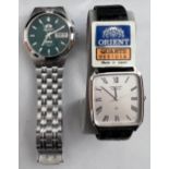 Two Orient wristwatches to include an automatic day/date stainless steel case and band with Orient