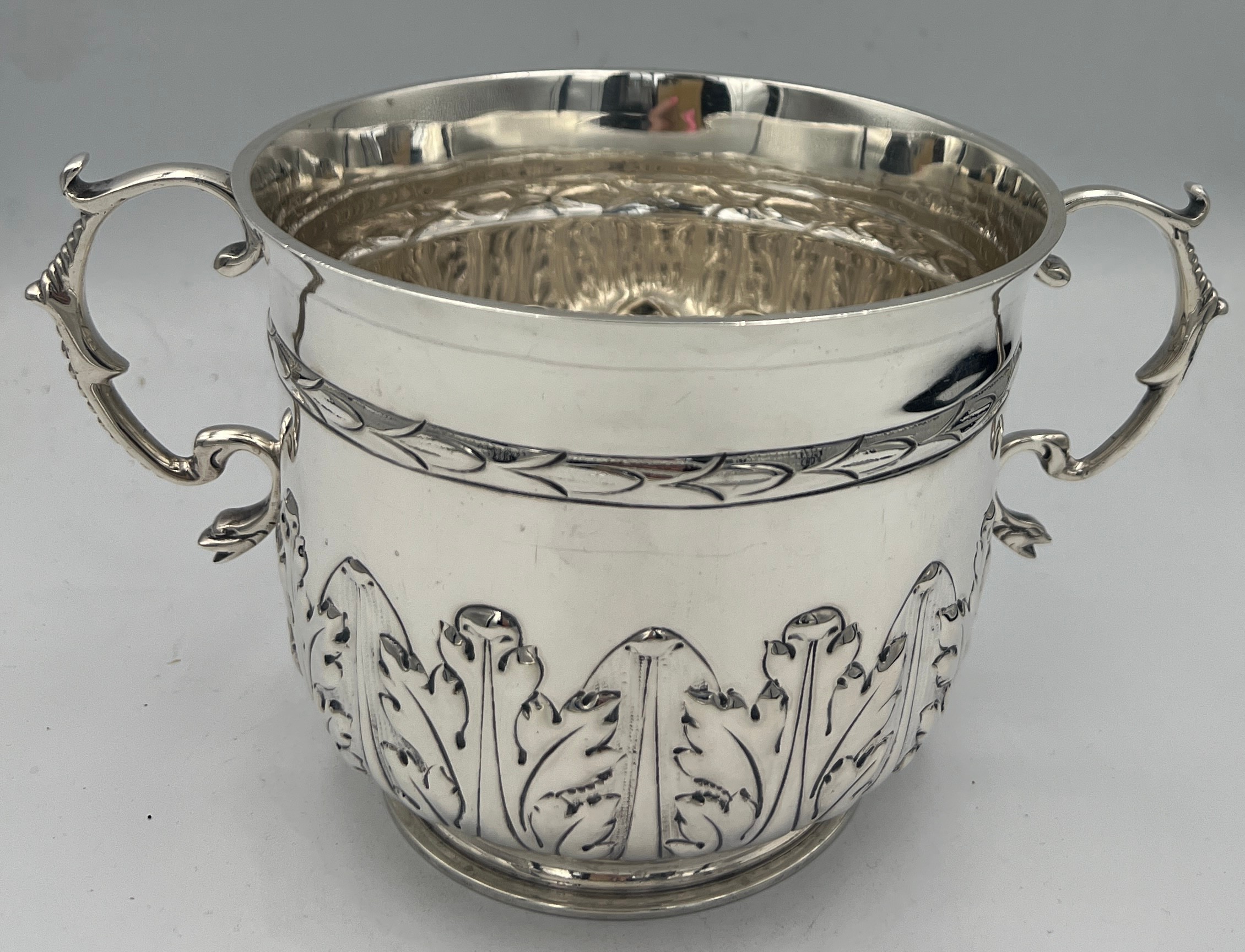 A hallmarked silver porringer. Sheffield 1929, maker William Hutton & Sons Ltd. 10cm h. Weight