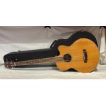 A Fleetwood Belcat EQ-7545R electric acoustic 4 string guitar, Model SBC- 200SE-SN in hard case