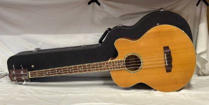 A Fleetwood Belcat EQ-7545R electric acoustic 4 string guitar, Model SBC- 200SE-SN in hard case