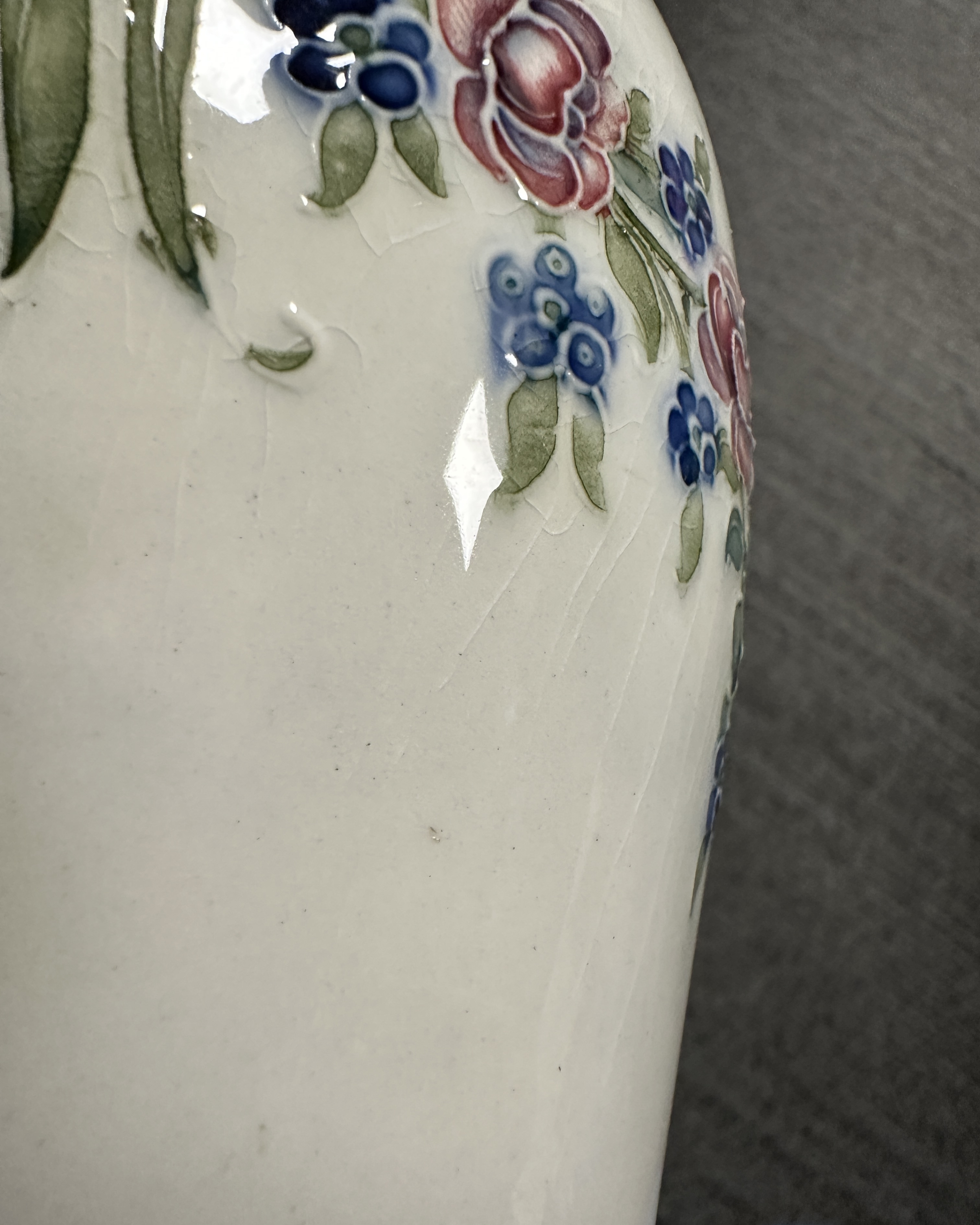A William Moorcroft for Macintyre Burslem vase with floral garlands and rosettes. 19cms. Stamped - Image 5 of 5